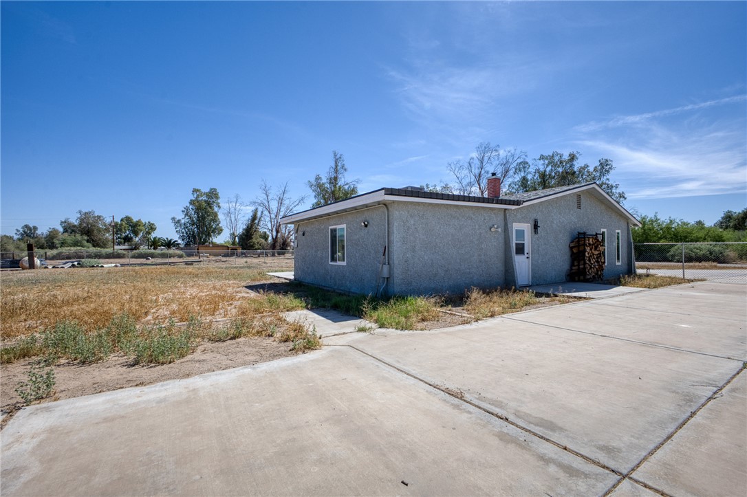 2053 Regents Road Mohave Valley, AZ 86440 - Photo 39 of 65 The property features a concrete driveway and exterior stucco finish