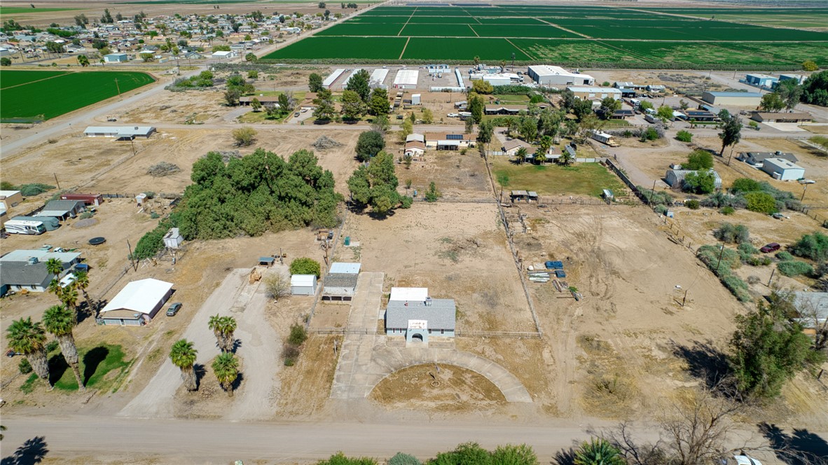 2053 Regents Road Mohave Valley, AZ 86440 - Photo 59 of 65 Aerial view showcasing the property with a circular driveway and surrounding desert landscape