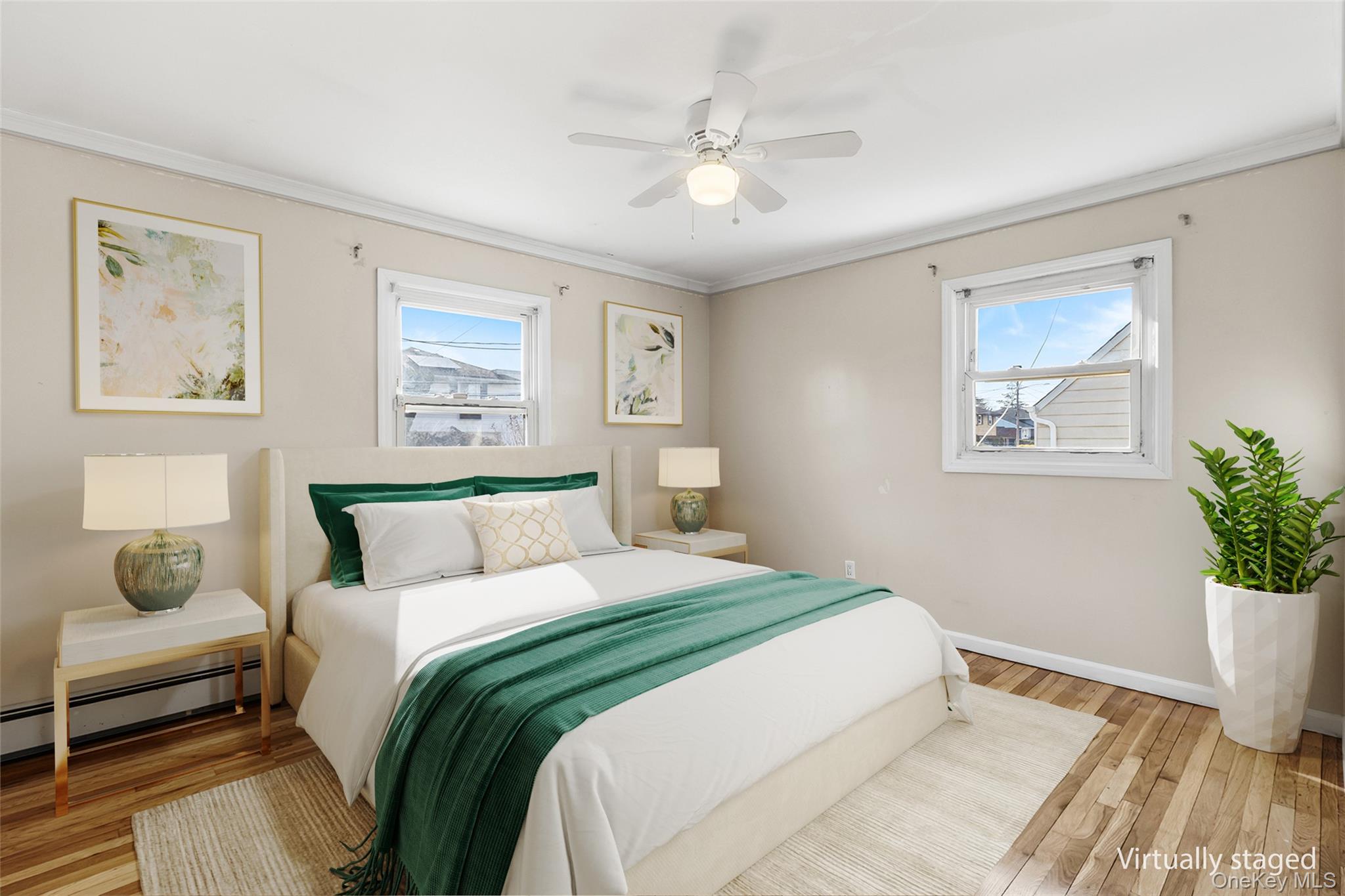 119 Osborne Road West Hempstead, NY 11552 - Photo 14 of 34 a bedroom with a large bed and a window