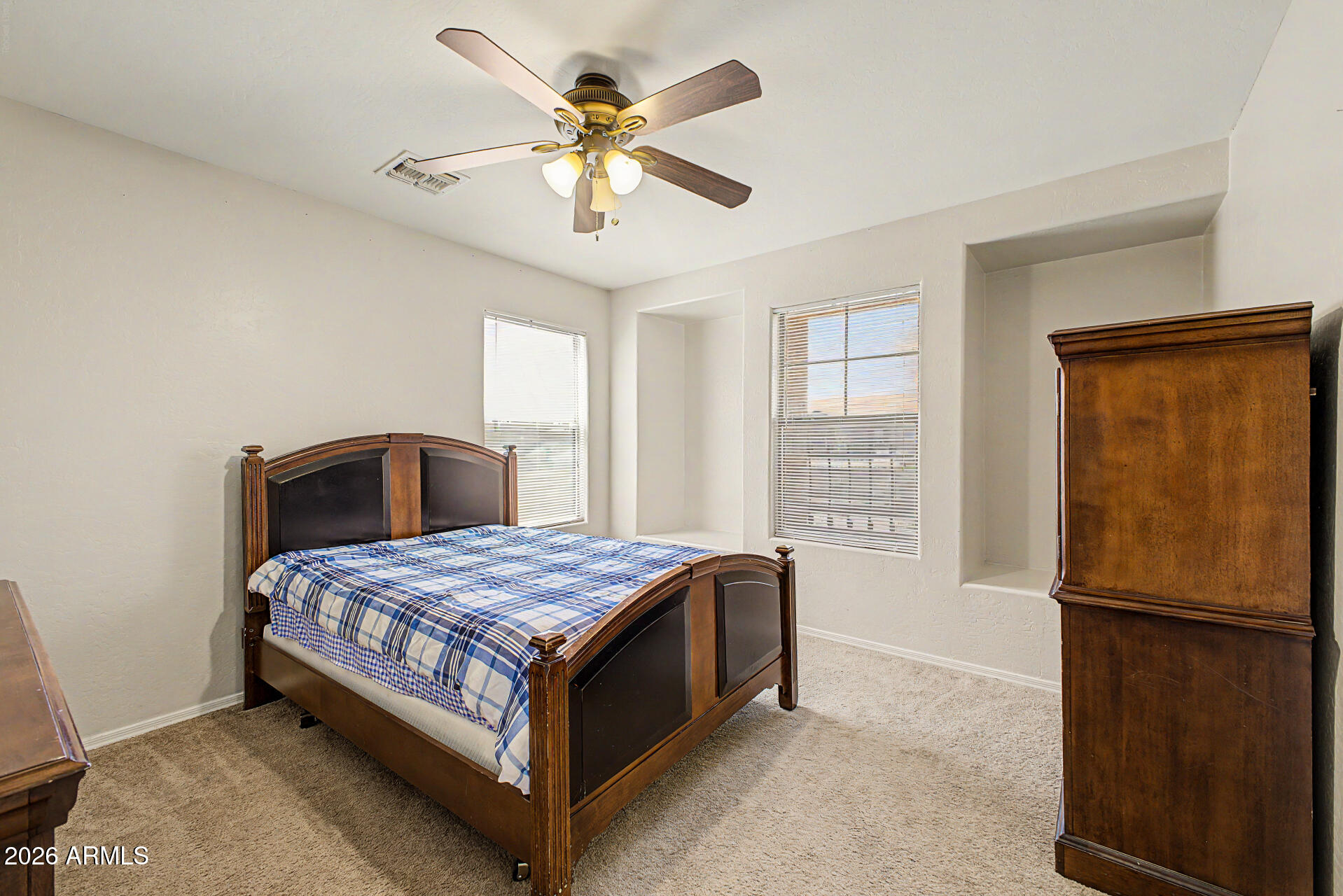 6622 West Harwell Road Laveen, AZ 85339 - Photo 26 of 32 a bedroom with a bed and window