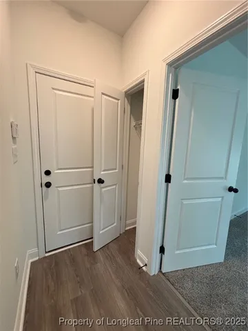 an empty room with a empty space and a window