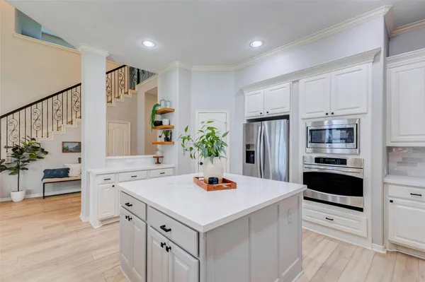 a spacious bathroom with a double vanity sink mirror and