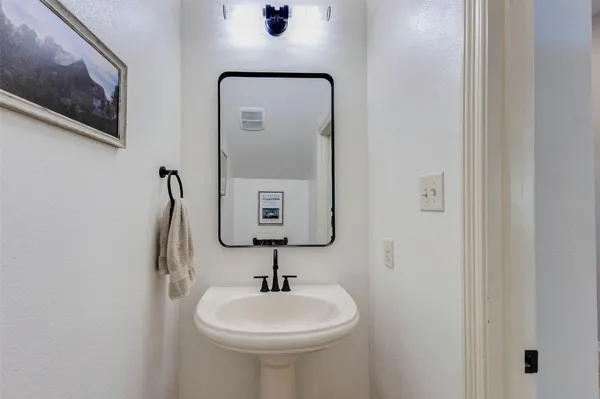 a view of house with garden space and trees