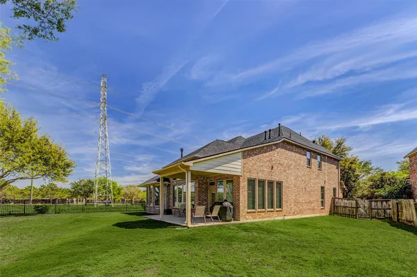 $585,000 | 27511 Cinco Terrace Drive, Katy, TX 77494