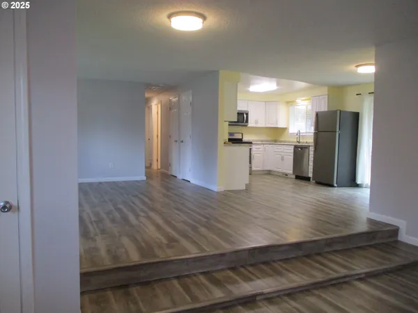 a room with cabinets and gym equipment