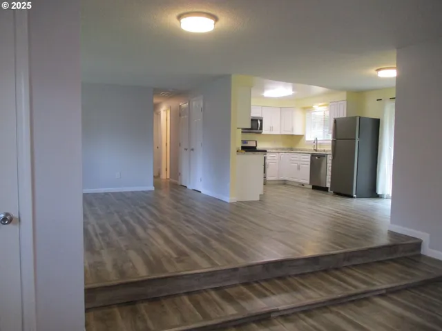 a room with cabinets and gym equipment