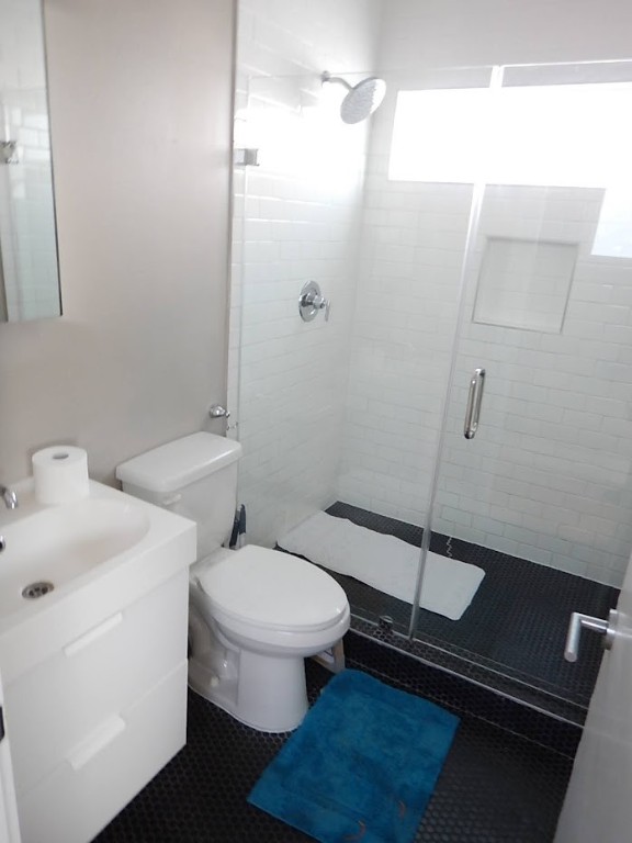 1508 Dumble Street Houston, TX 77023 - Photo 4 of 6 a bathroom with a toilet and a sink