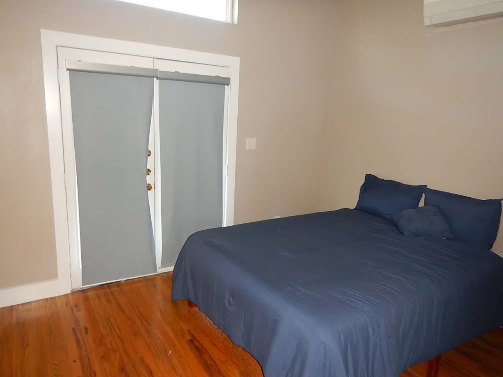 1508 Dumble Street Houston, TX 77023 - Photo 6 of 6 a bed room with a bed