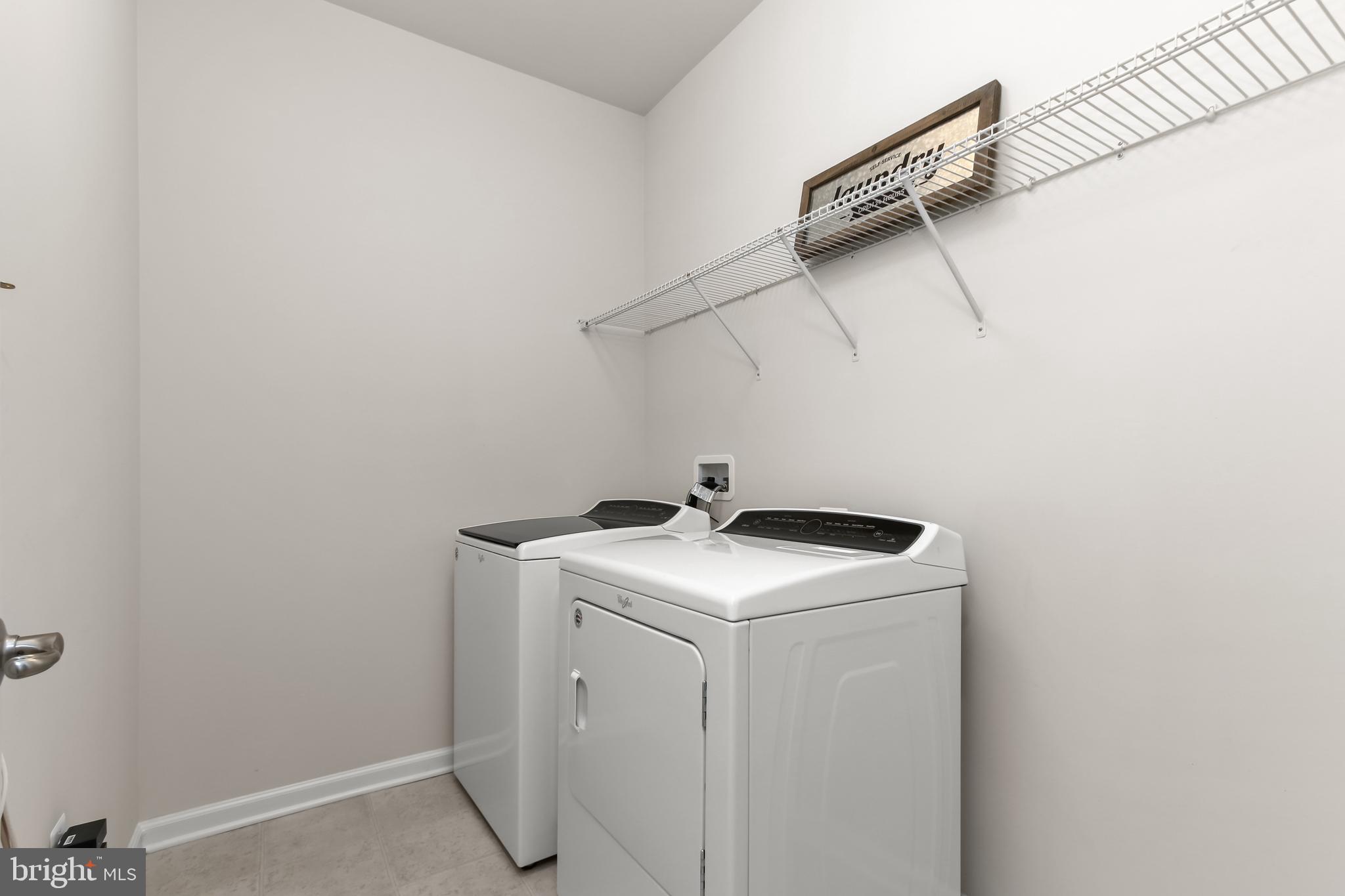 14311 Ridge View Lane Laurel, MD 20707 - Photo 19 of 29 a utility room with dryer and washer