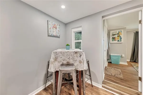 a view of a dining room with furniture