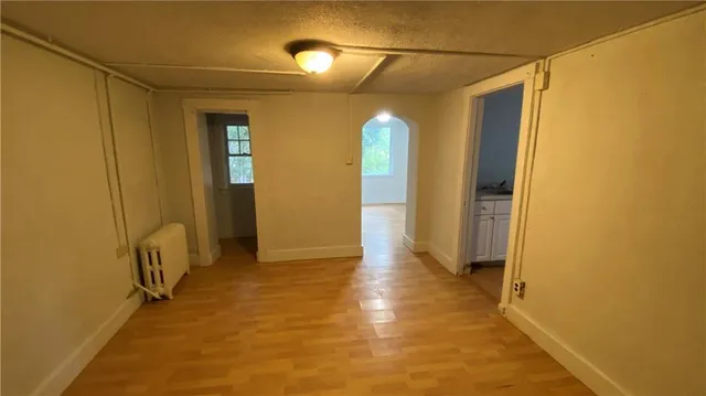 a view of a bathroom with a shower and a tub