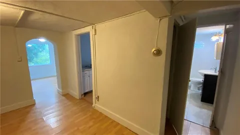 a view of a bathroom with a glass door