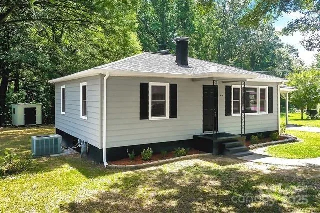 a house view with a swimming pool