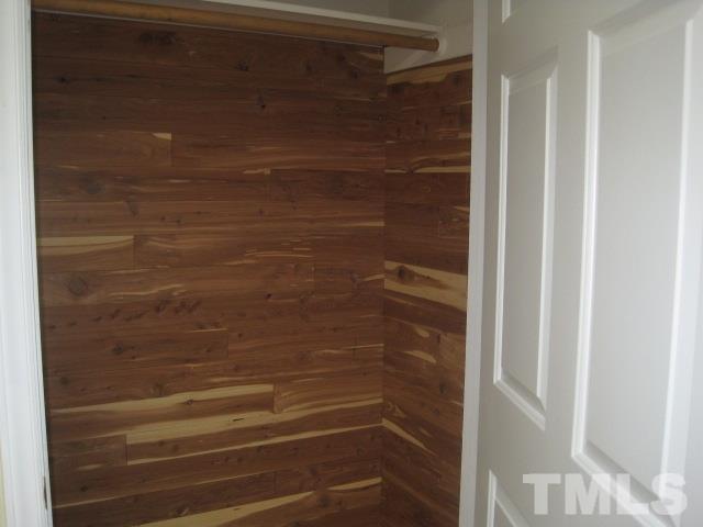 1336 Turner Farms Road Garner, NC 27529 - Photo 16 of 22 Cedar lined closet in laundry room.