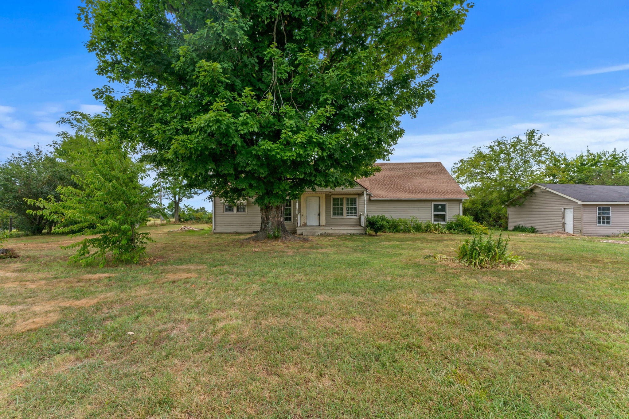 9310 Fredonia Road Manchester, TN 37355 - Photo 1 of 7 a view of a house with a yard