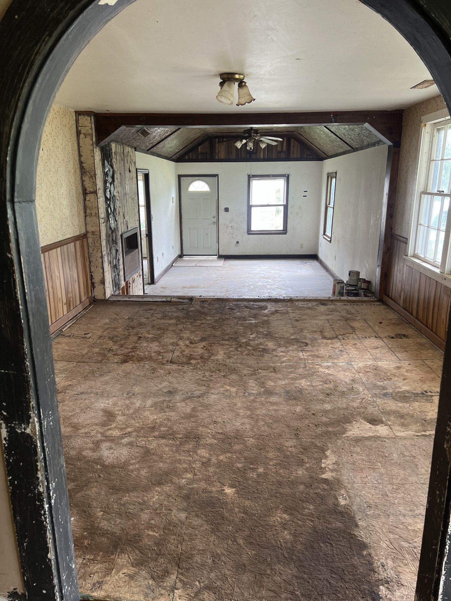 9310 Fredonia Road Manchester, TN 37355 - Photo 4 of 7 a view of a hallway view with wooden floor and a fireplace