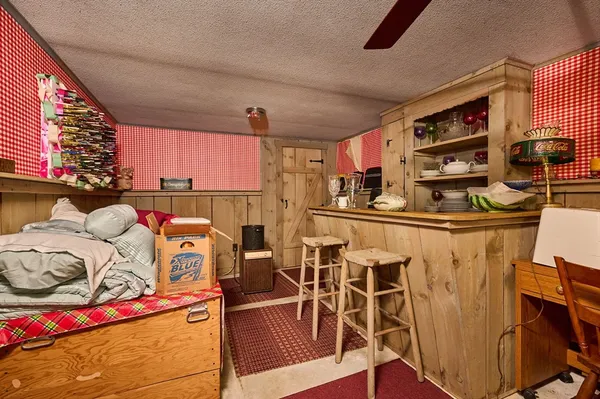 a view of a house with a snow in the background