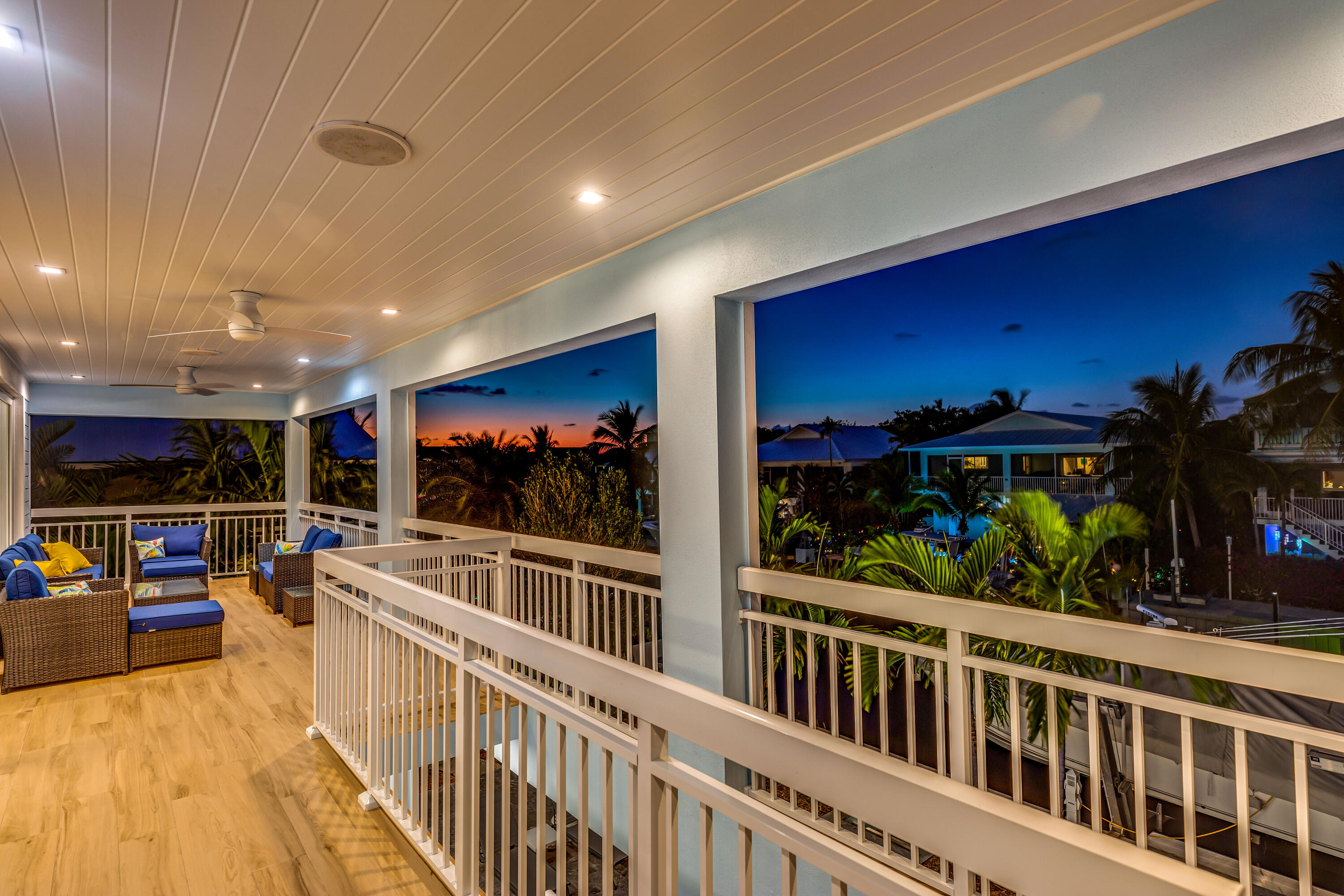 121 Lake Road Tavernier, FL 33070 - Photo 18 of 70 a view of a chairs and tables in the balcony