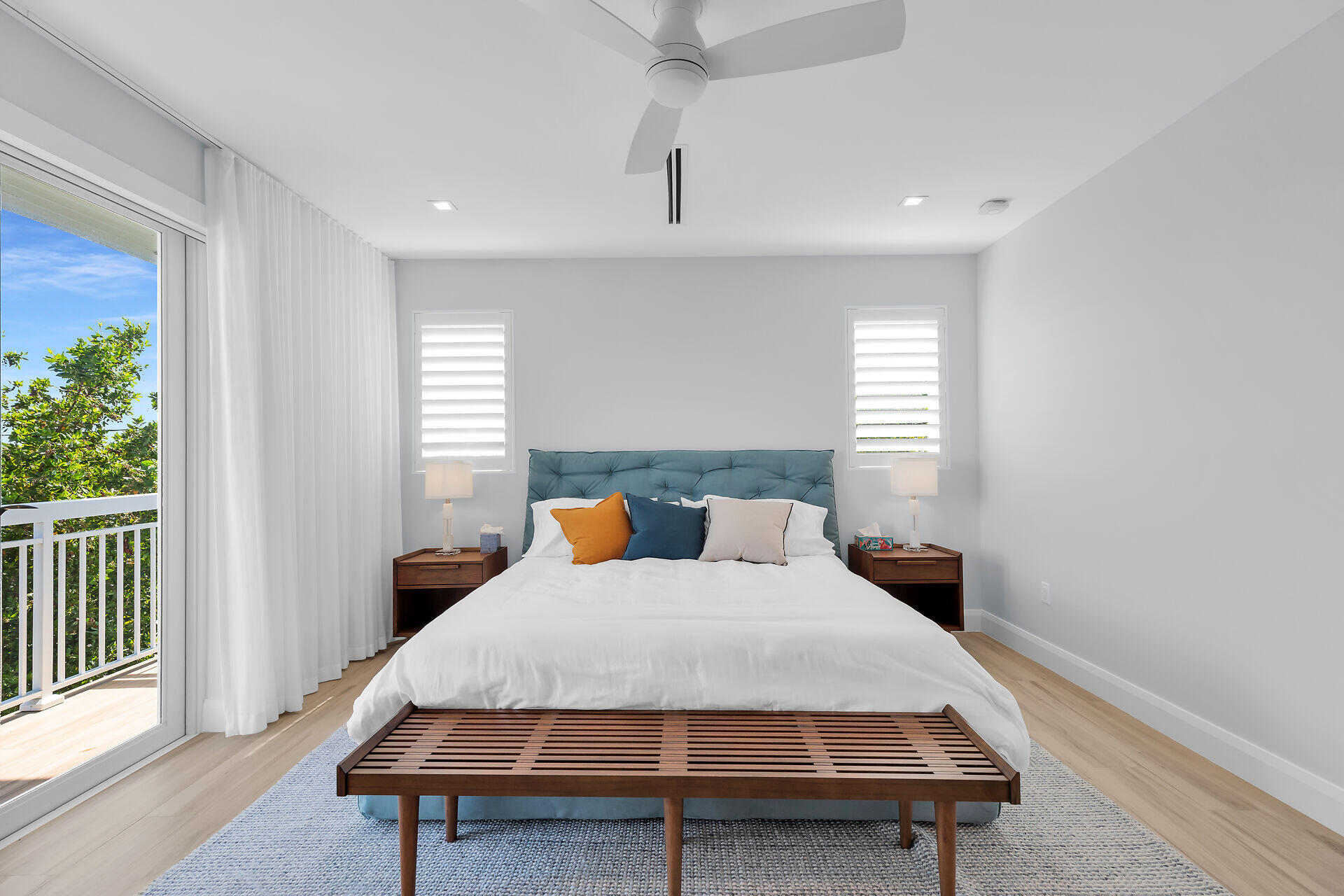 121 Lake Road Tavernier, FL 33070 - Photo 21 of 70 a bed sitting in a spacious bedroom next to a window