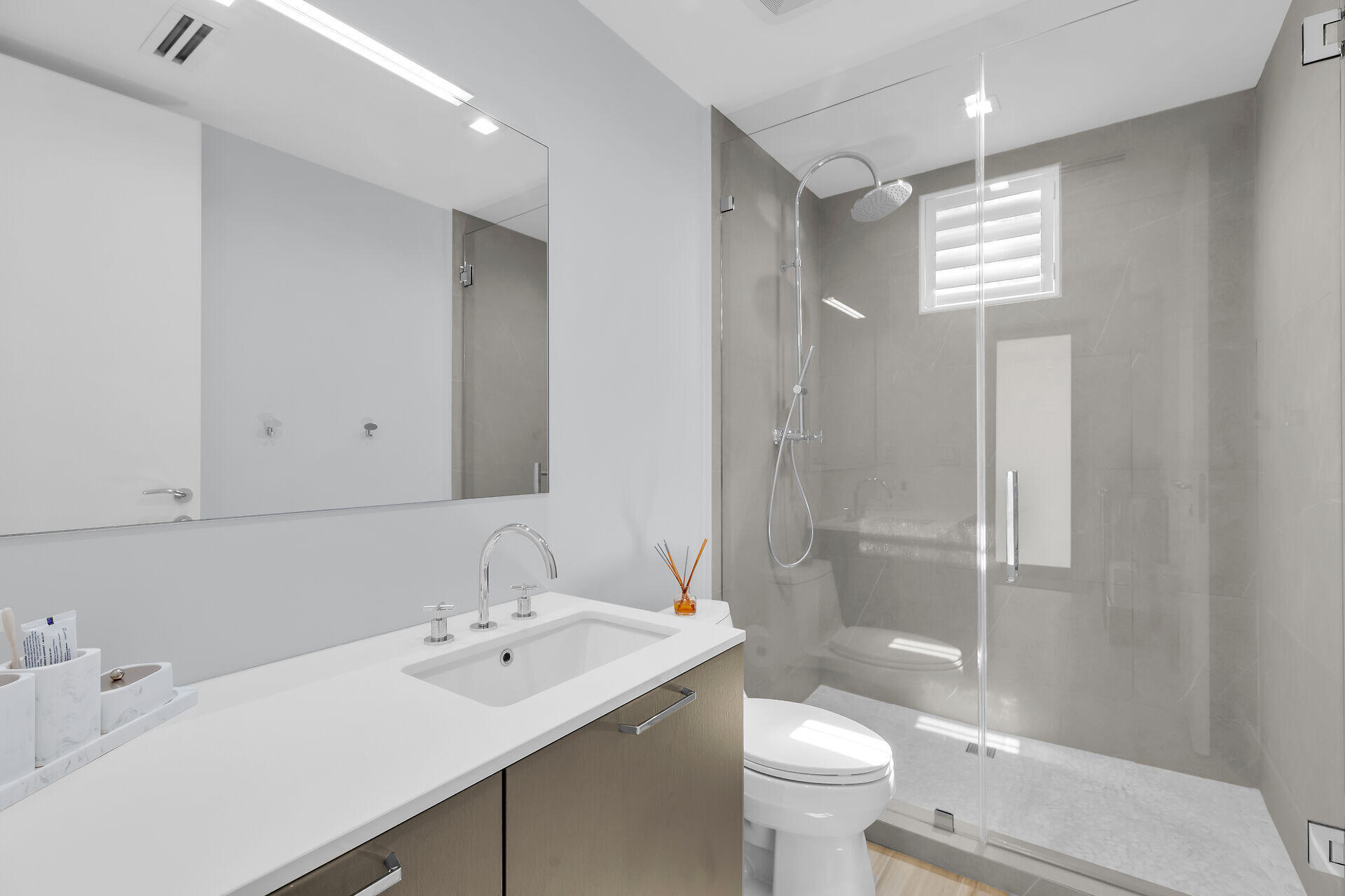 121 Lake Road Tavernier, FL 33070 - Photo 36 of 70 a bathroom with a sink toilet and shower