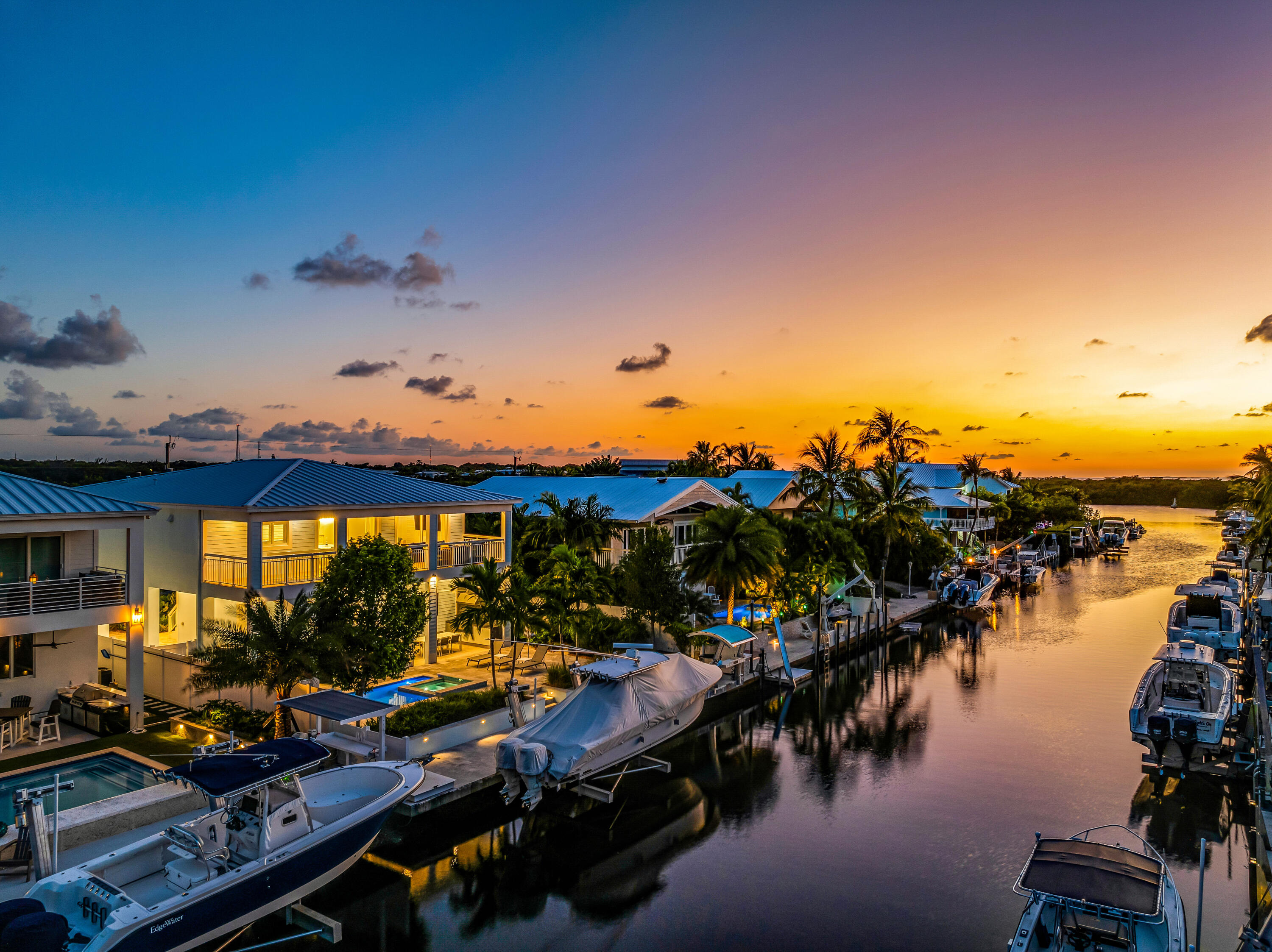 121 Lake Road Tavernier, FL 33070 - Photo 58 of 70 a view of a swimming pool with outdoor seating