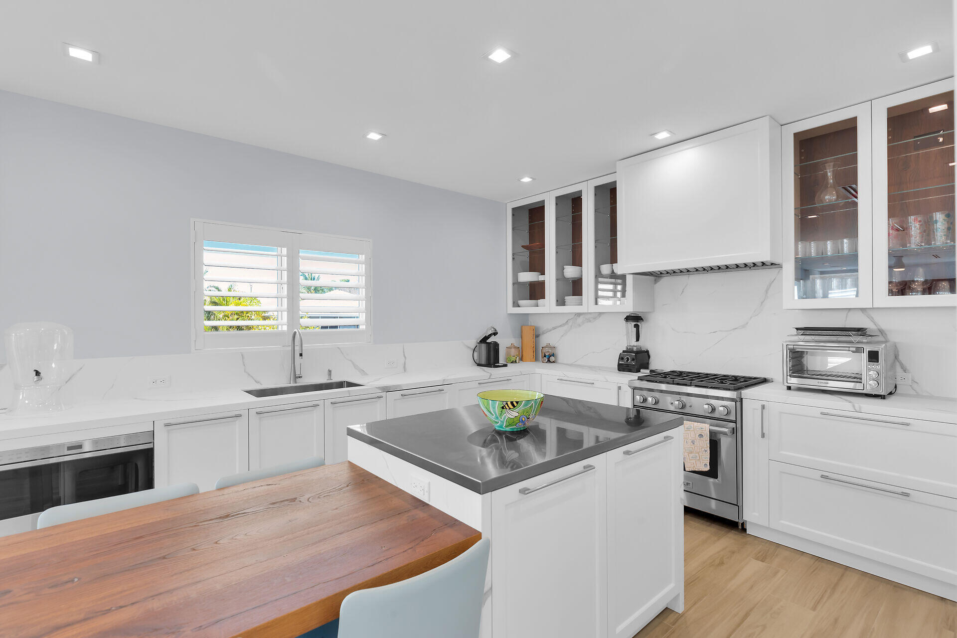 121 Lake Road Tavernier, FL 33070 - Photo 10 of 51 a kitchen with granite countertop a sink stainless steel appliances and cabinets