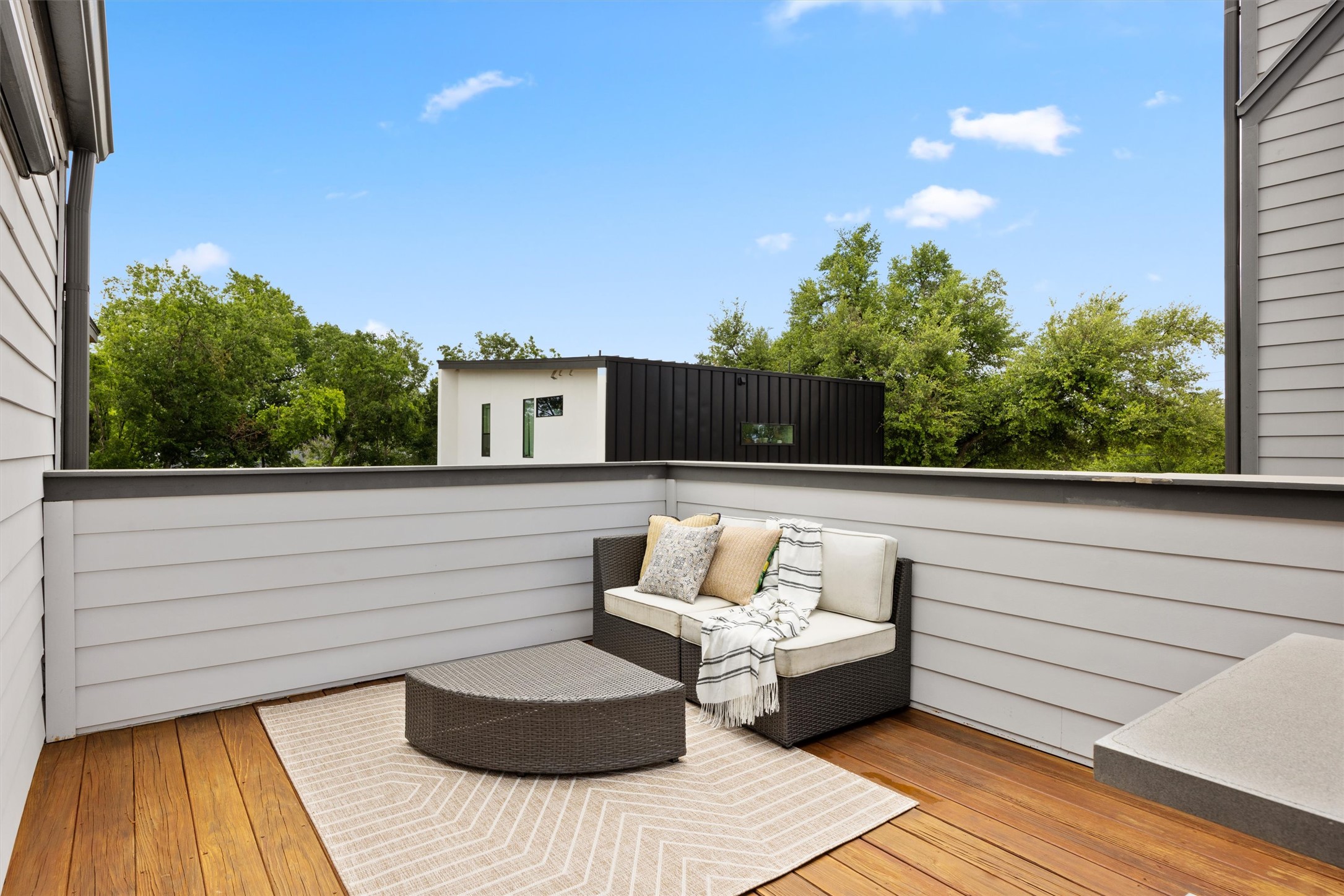 1116 Stobaugh Street, Unit B Austin, TX 78757 - Photo 27 of 38 The second-floor balcony provides an additional outdoor space to relax or unwind.