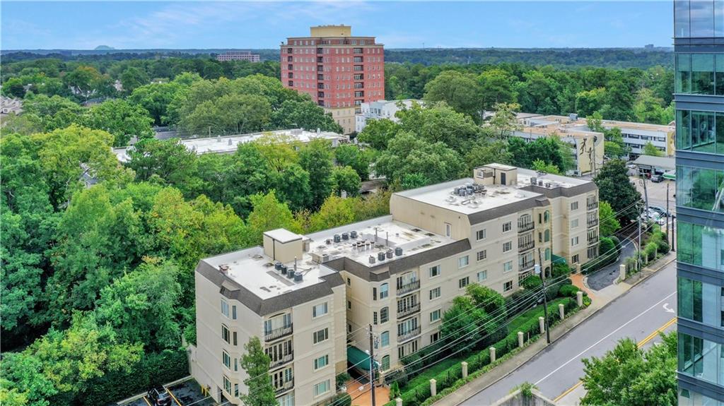 an aerial view of a house with a garden