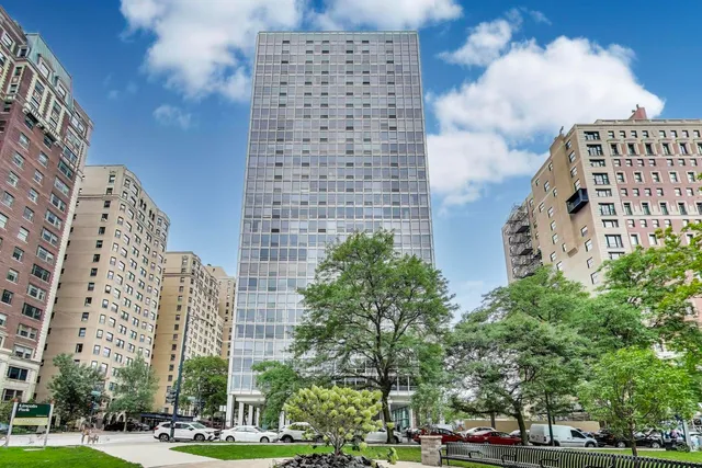 a view of a building with a street