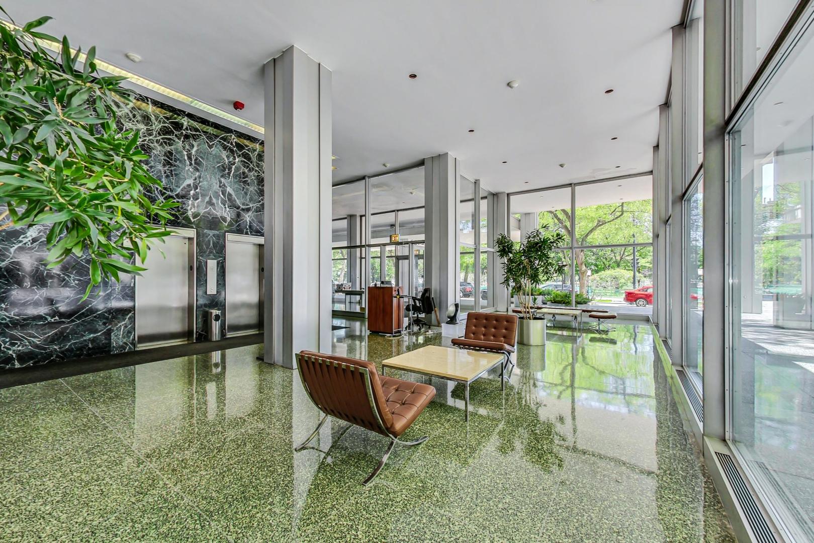 2400 North Lakeview Avenue, Unit 1708 Chicago, IL 60614 - Photo 3 of 50 a living room with patio furniture and a potted plant