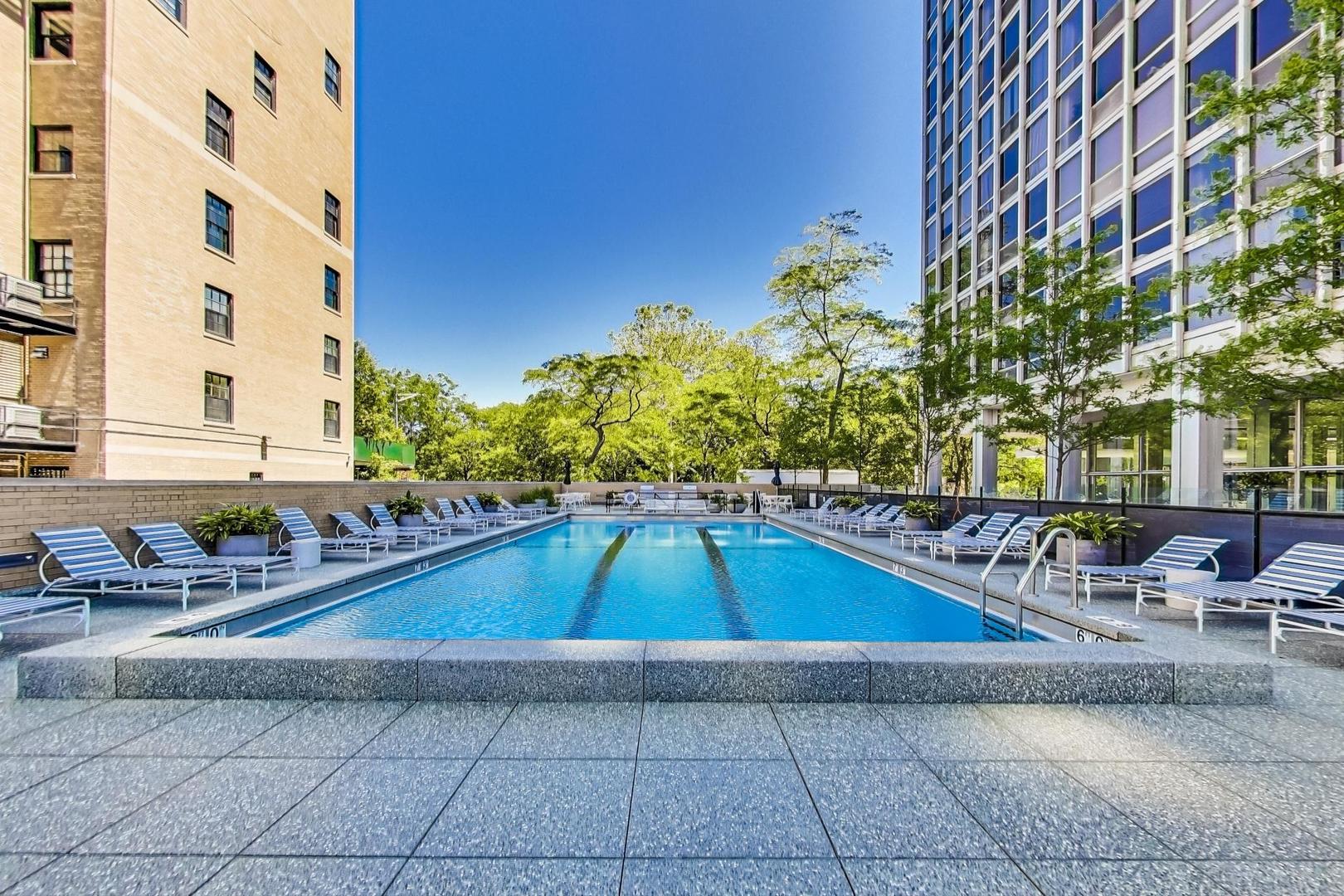 2400 North Lakeview Avenue, Unit 1708 Chicago, IL 60614 - Photo 36 of 50 a view of swimming pool with outdoor seating