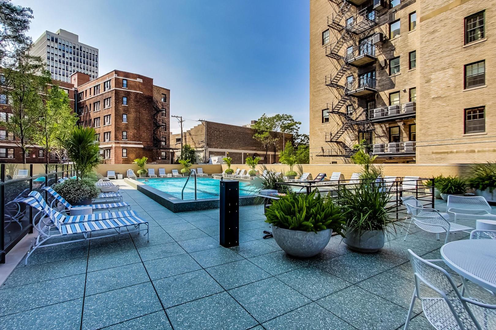2400 North Lakeview Avenue, Unit 1708 Chicago, IL 60614 - Photo 38 of 50 a view of a patio with couches and a potted plants