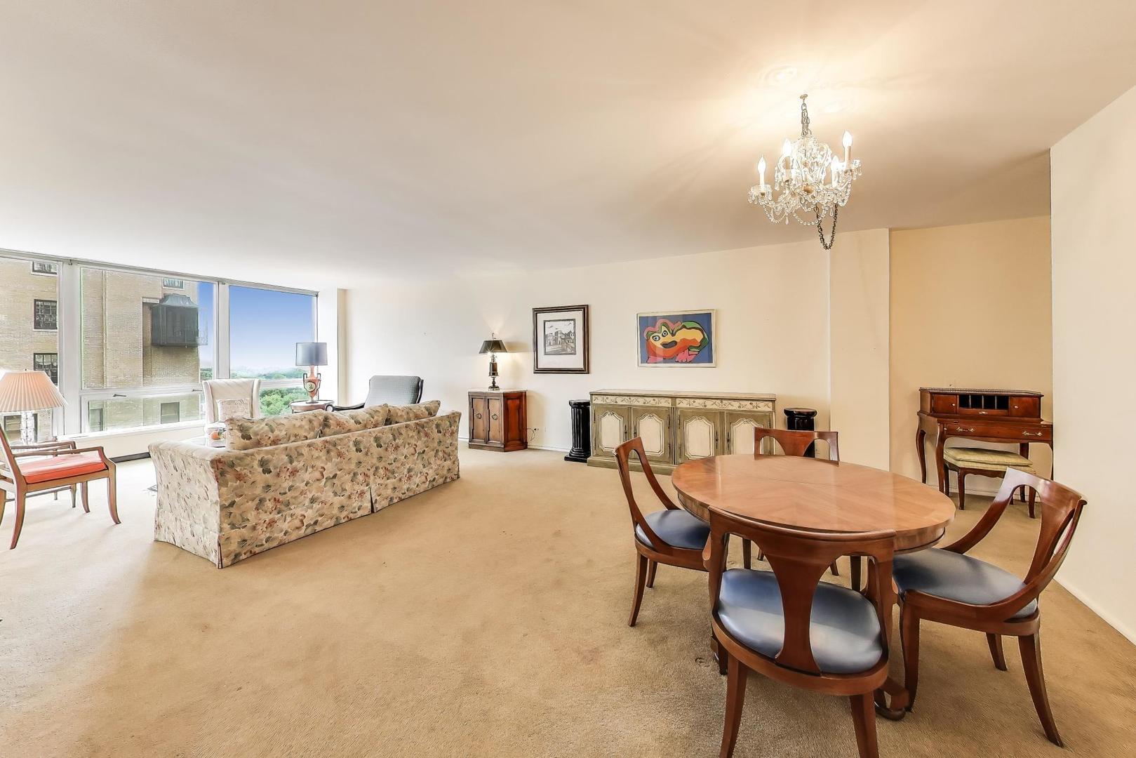 2400 North Lakeview Avenue, Unit 1708 Chicago, IL 60614 - Photo 5 of 50 a living room with furniture and a chandelier