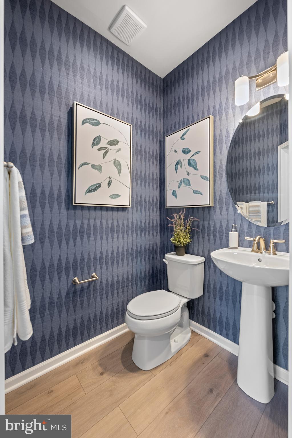 156 Bancroft Road, Unit CARLTON Kennett Square, PA 19348 - Photo 11 of 47 a bathroom with a toilet a sink and a mirror