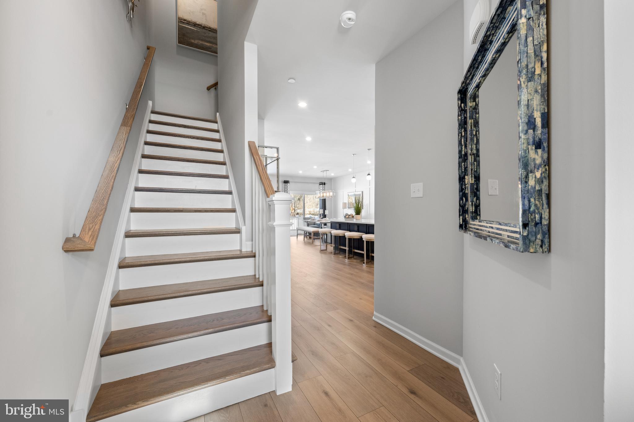 156 Bancroft Road, Unit CARLTON Kennett Square, PA 19348 - Photo 12 of 47 a view of entryway and hall with wooden floor