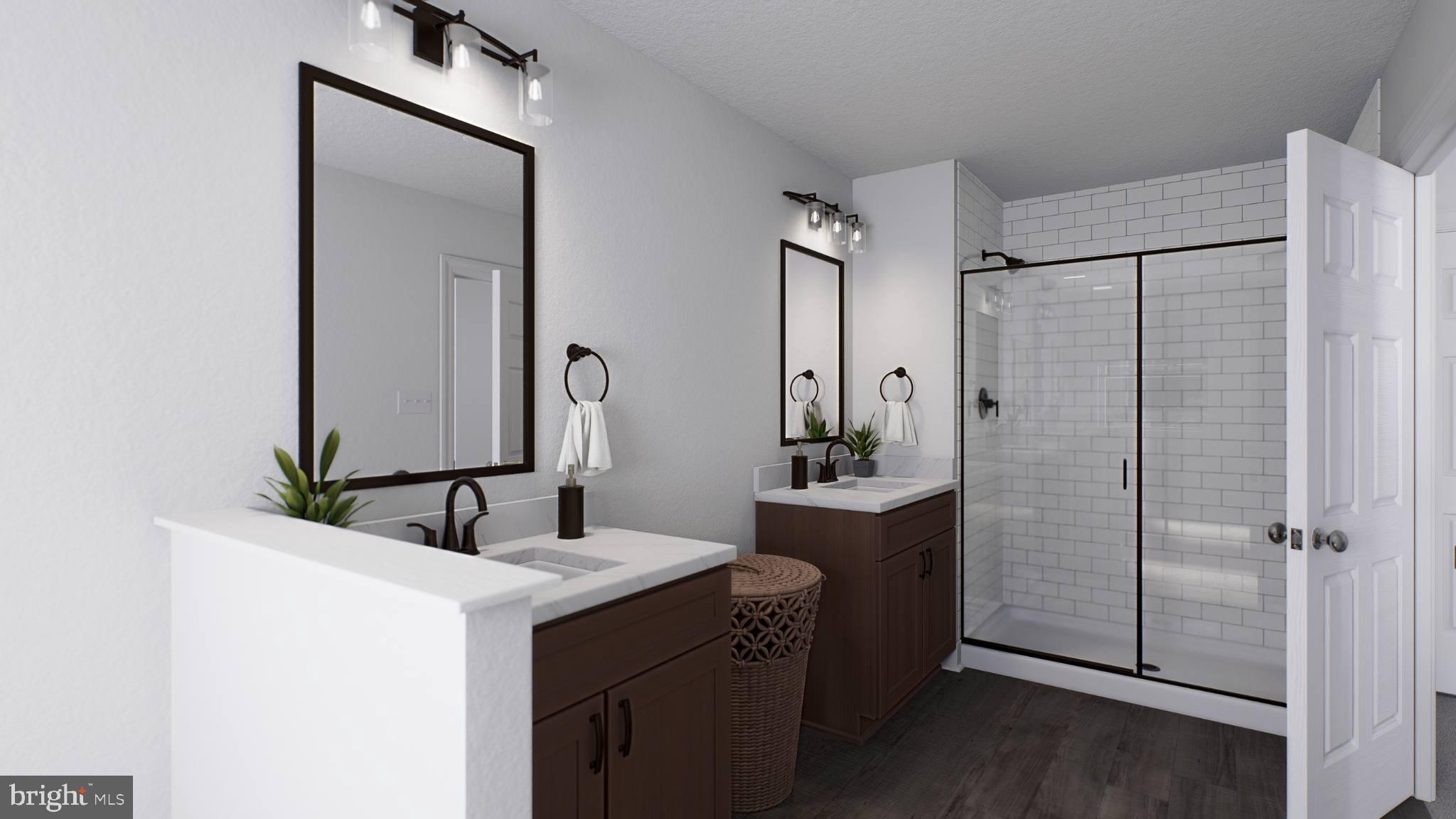 156 Bancroft Road, Unit CARLTON Kennett Square, PA 19348 - Photo 15 of 46 a bathroom with a double vanity sink mirror and shower
