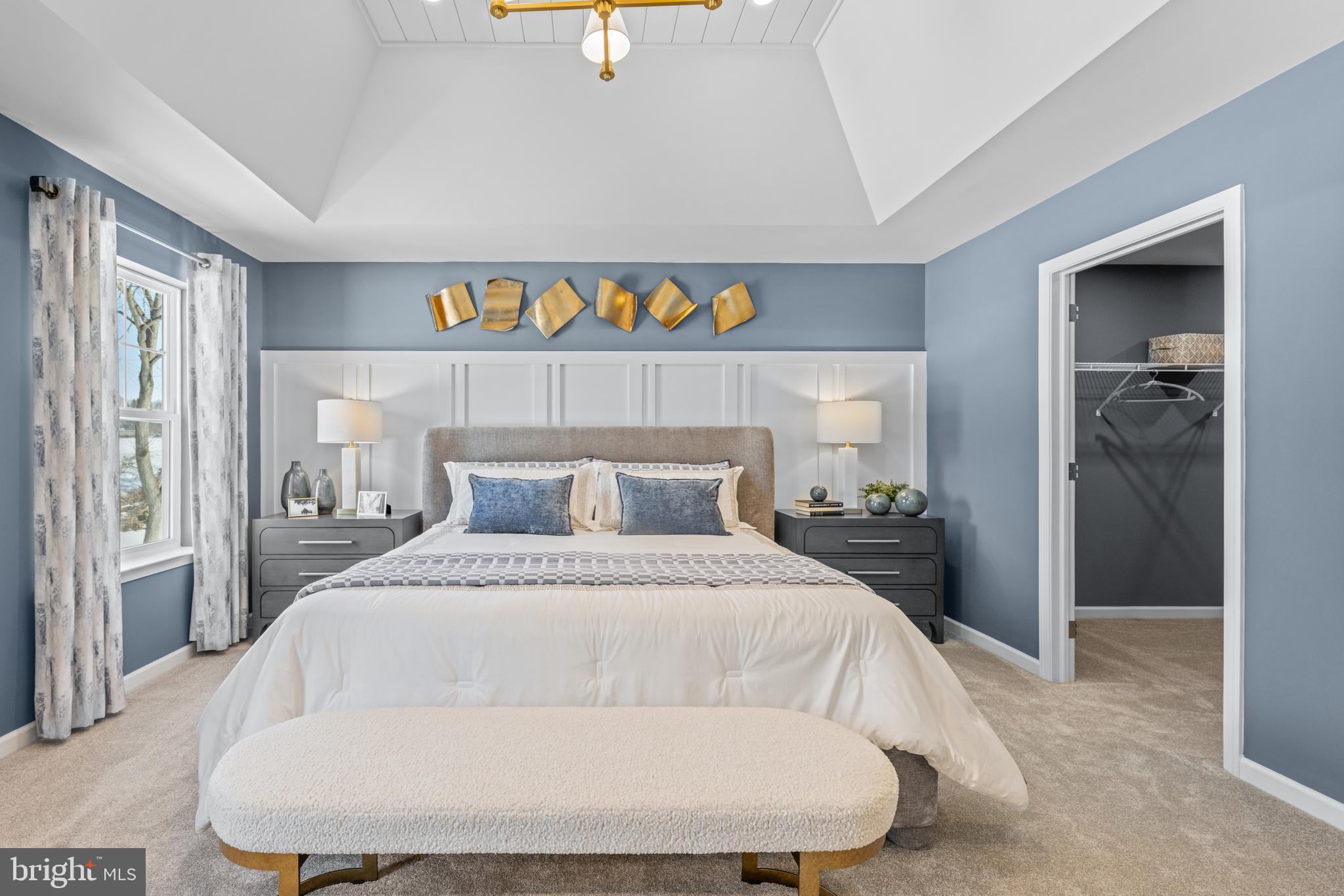 156 Bancroft Road, Unit CARLTON Kennett Square, PA 19348 - Photo 17 of 47 a large white bed in a white room