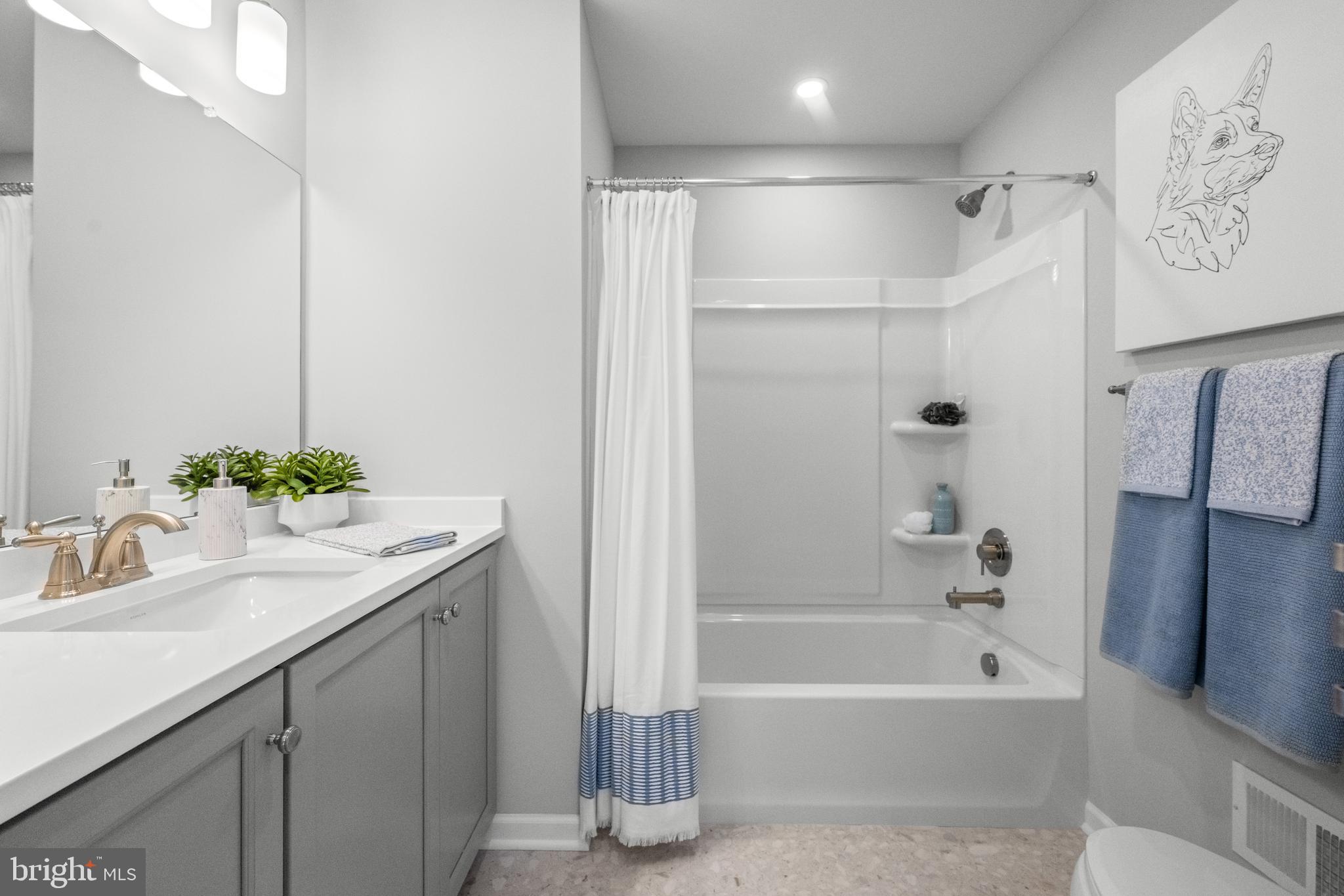 156 Bancroft Road, Unit CARLTON Kennett Square, PA 19348 - Photo 20 of 47 a bathroom with a sink and a bathtub