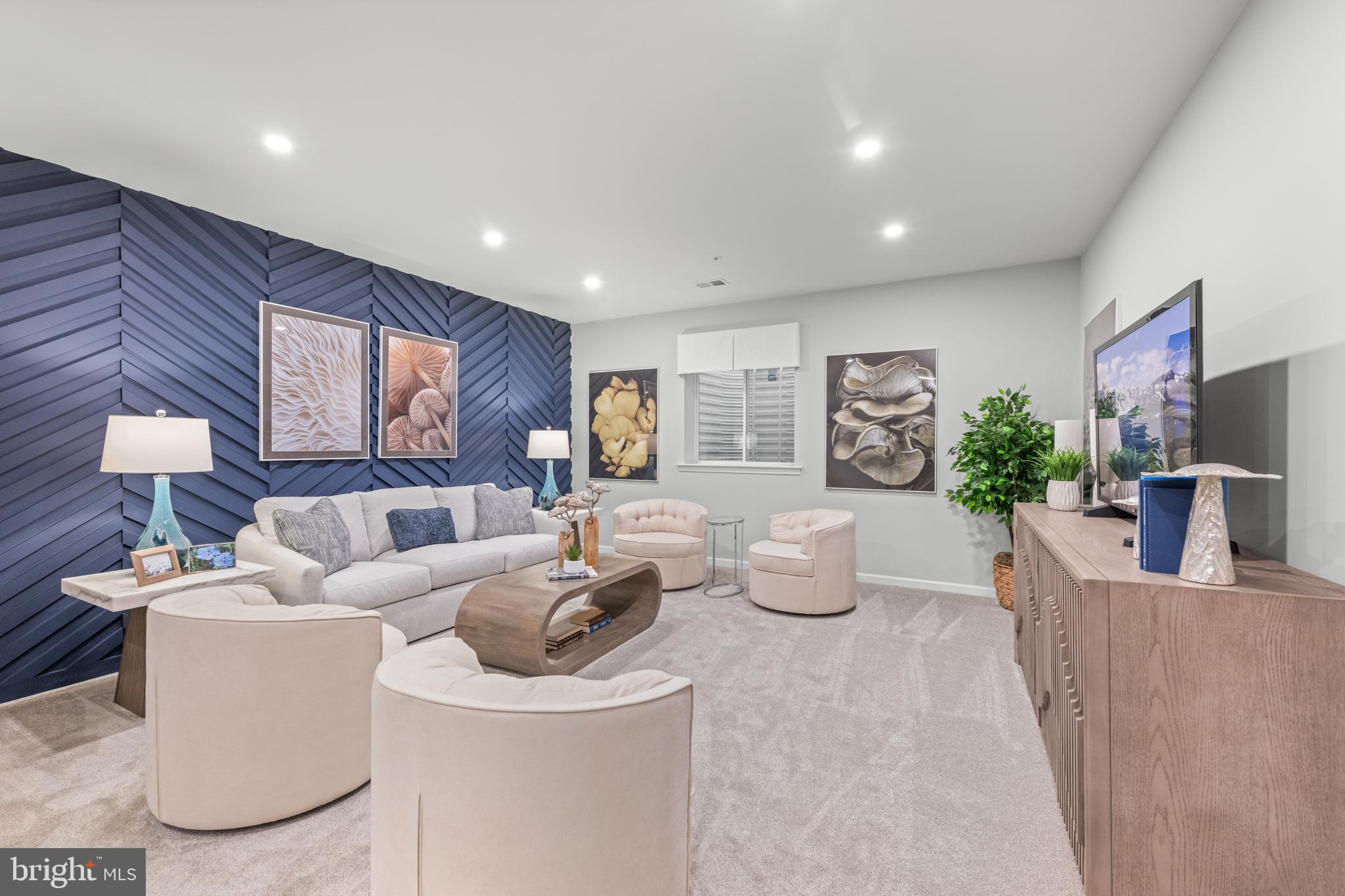 156 Bancroft Road, Unit CARLTON Kennett Square, PA 19348 - Photo 24 of 47 a living room with furniture a window and potted plant