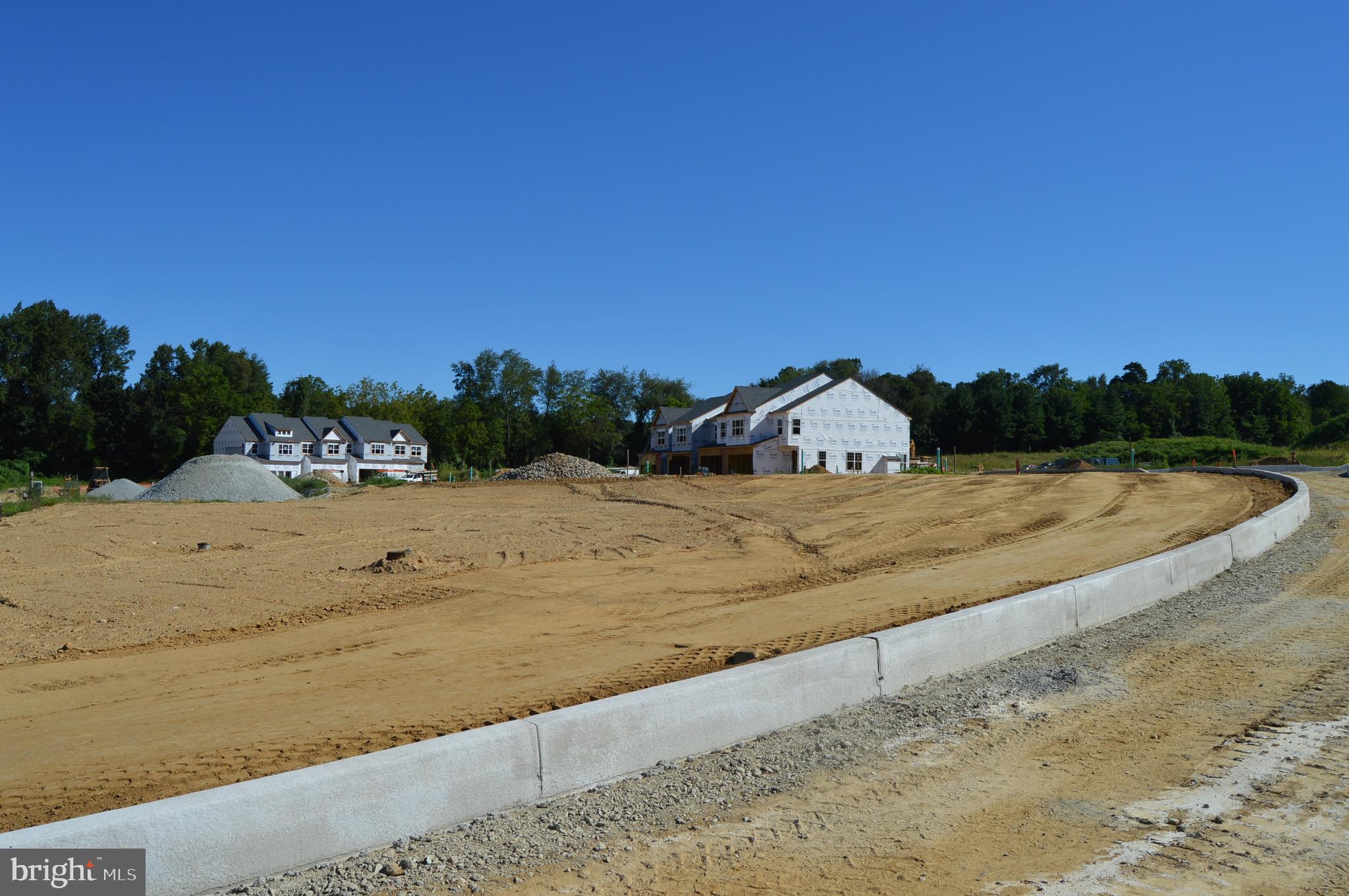 156 Bancroft Road, Unit CARLTON Kennett Square, PA 19348 - Photo 40 of 46 a view of a dry yard with a house