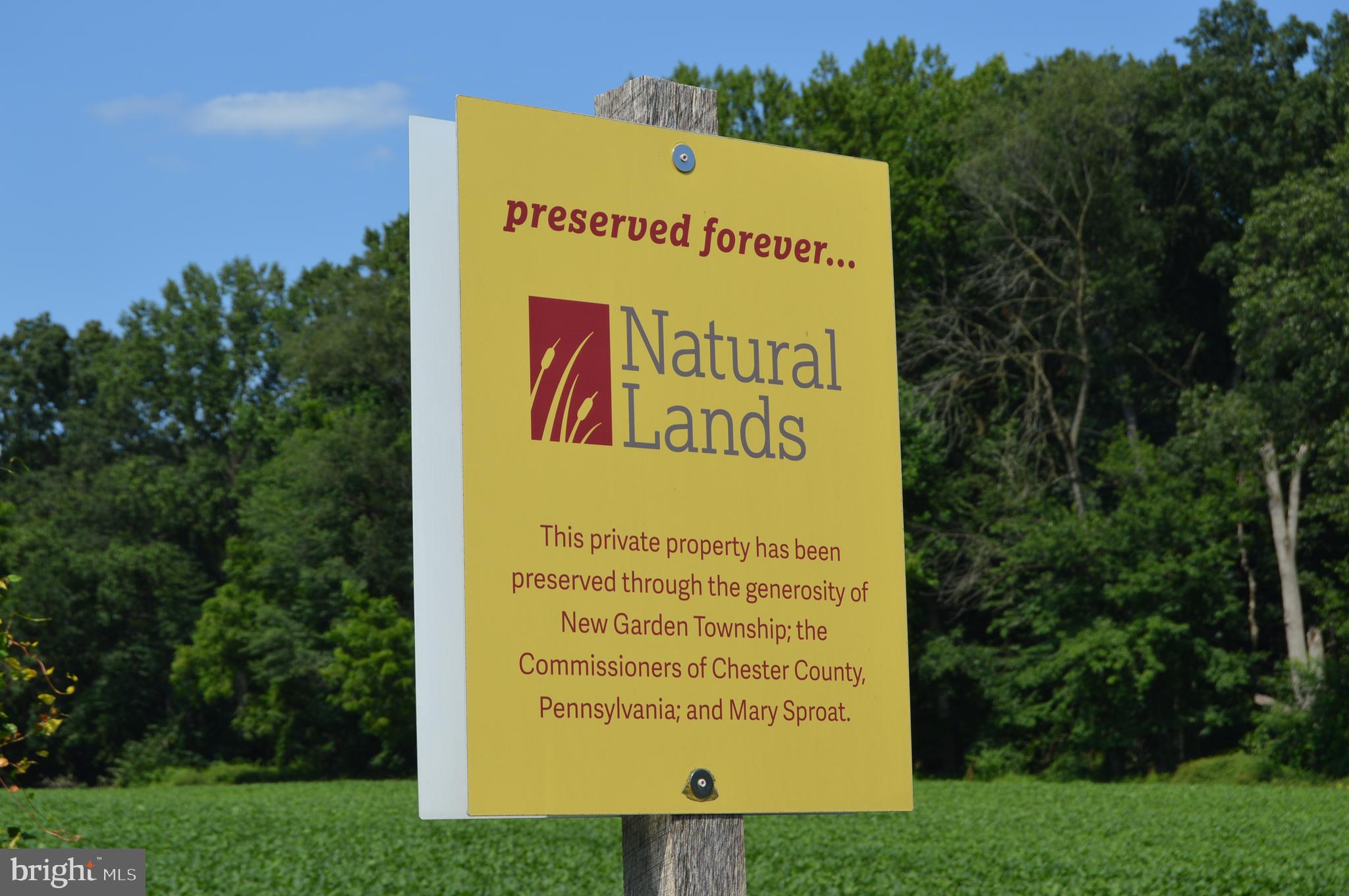 156 Bancroft Road, Unit CARLTON Kennett Square, PA 19348 - Photo 46 of 47 a sign on the side of the road