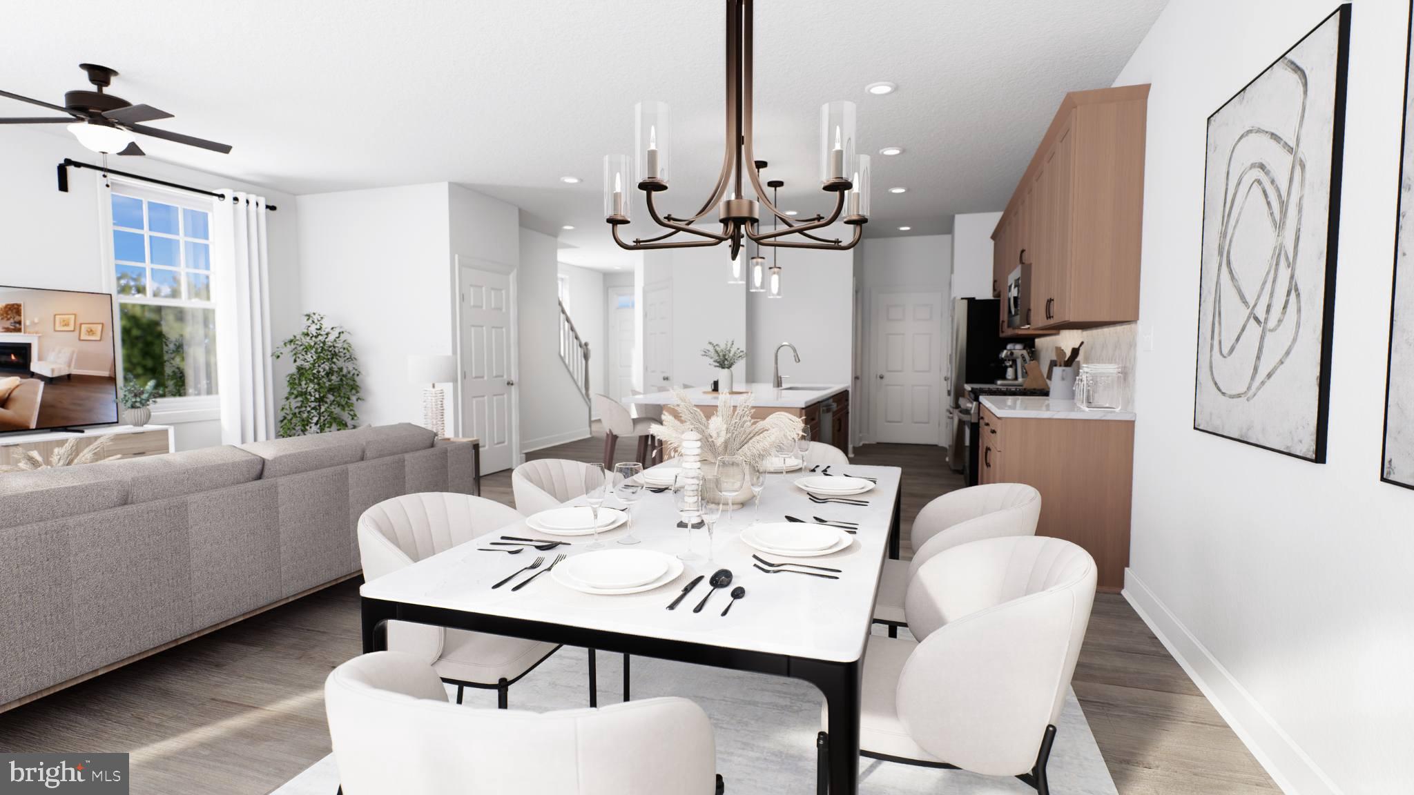 156 Bancroft Road, Unit CARLTON Kennett Square, PA 19348 - Photo 8 of 46 a view of a a dining room with furniture window and wooden floor