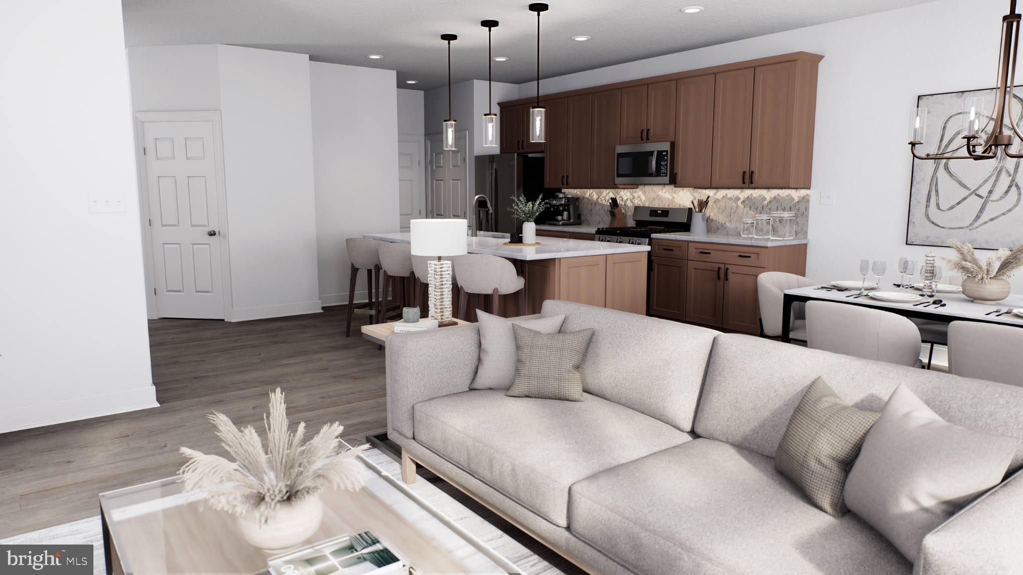 156 Bancroft Road, Unit CARLTON Kennett Square, PA 19348 - Photo 9 of 46 a living room with furniture kitchen view and a window