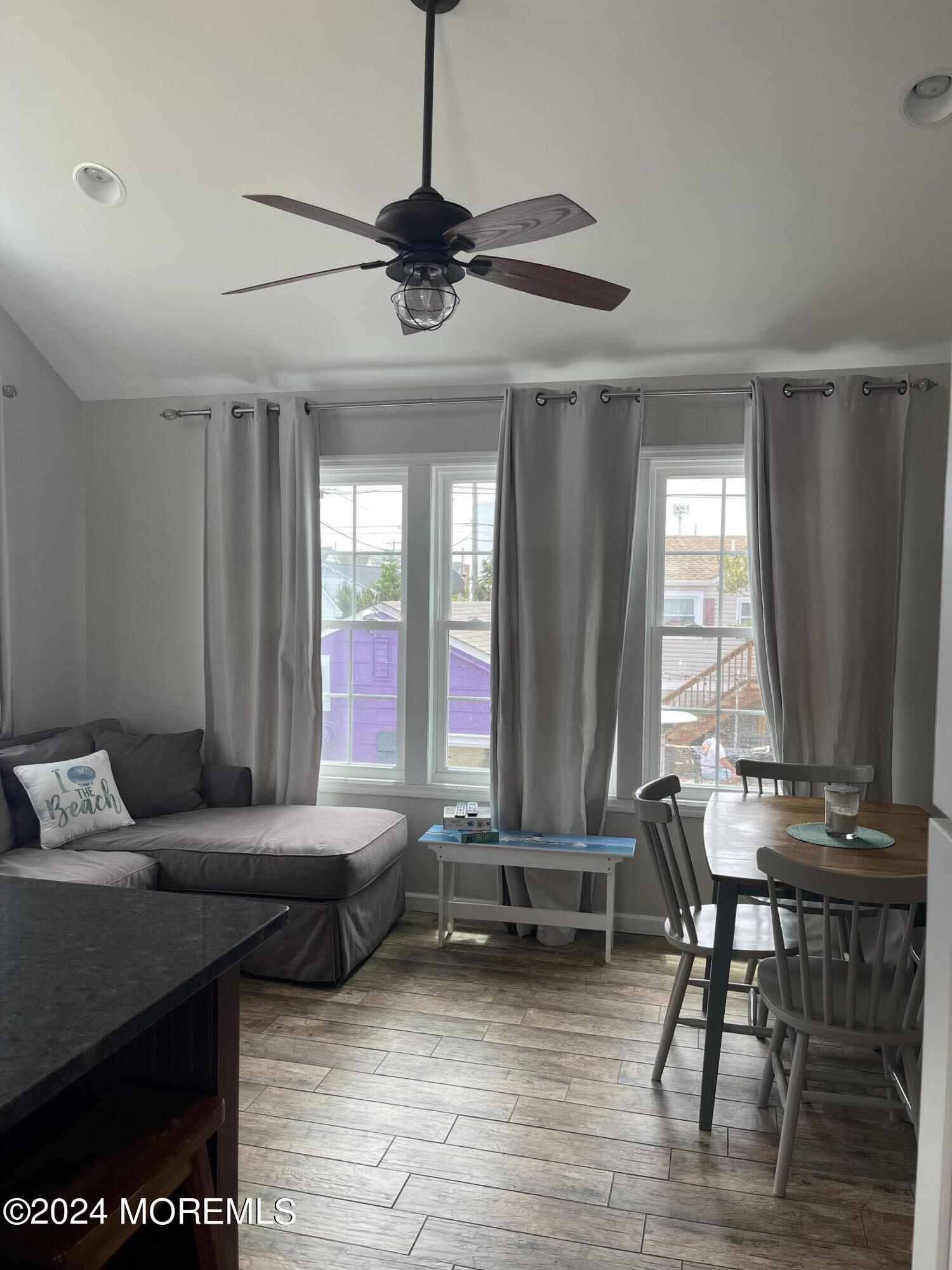 104 West Chadwick Way Lavallette, NJ 08735 - Photo 5 of 13 a living room with furniture and a large window