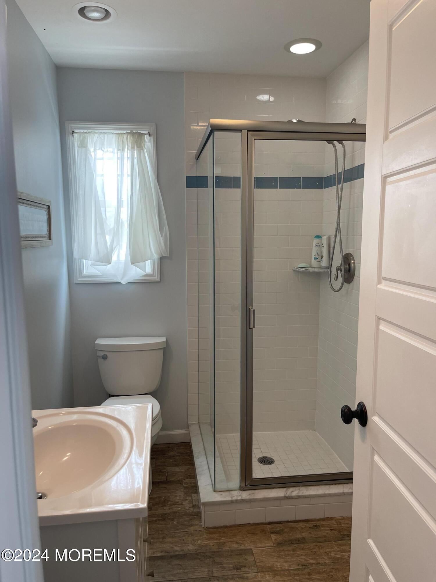 104 West Chadwick Way Lavallette, NJ 08735 - Photo 9 of 13 a bathroom with a toilet and a shower