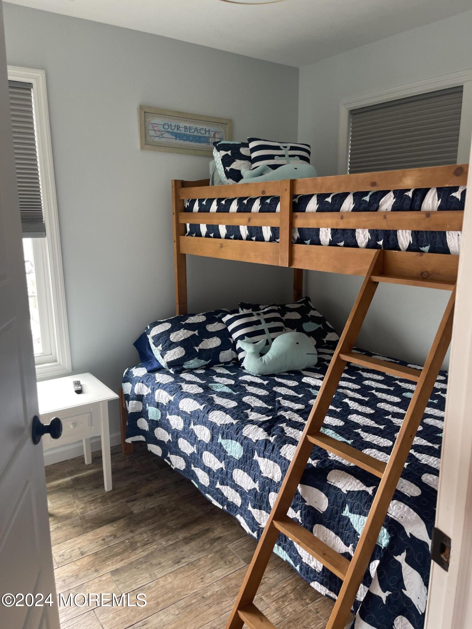 104 West Chadwick Way Lavallette, NJ 08735 - Photo 10 of 13 a bedroom with a bed and a window