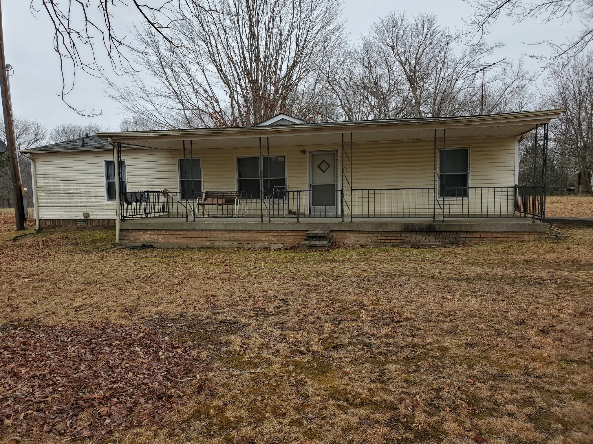 4531 Akin Road Cunningham, TN 37052 - Photo 9 of 10 a front view of a house with garden