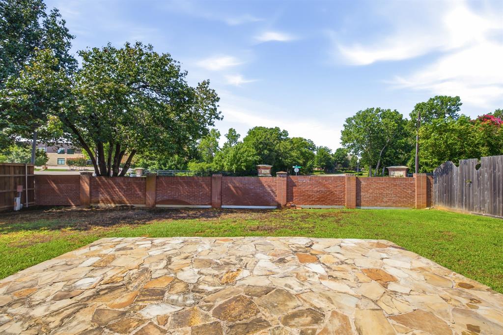 1911 New Haven Road Grapevine, TX 76051 - Photo 37 of 39 Extended flagstone patio.