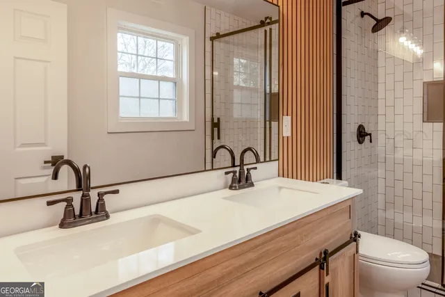 a bathroom with a sink and a toilet