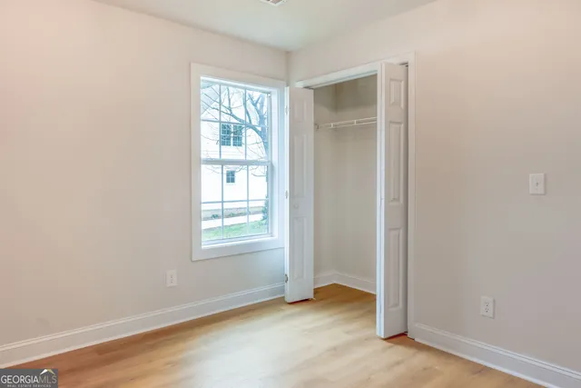 an empty room with windows